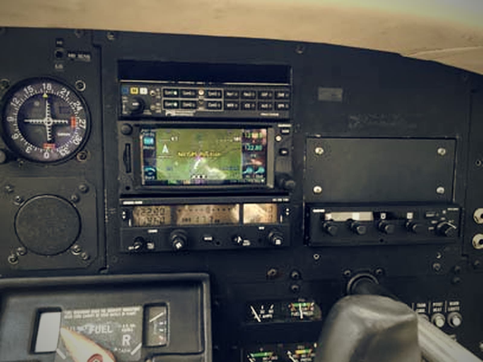 A Garmin avionics stack installed in an aircraft instrument panel.